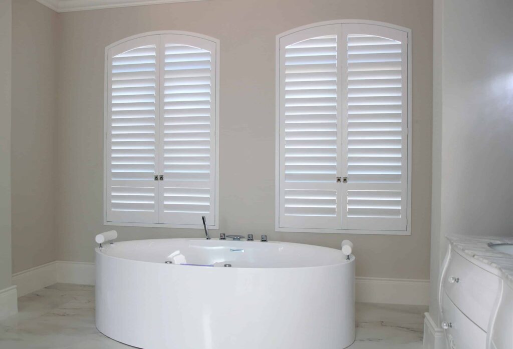 Norman White Arch Shutters Bathroom scaled 1 1
